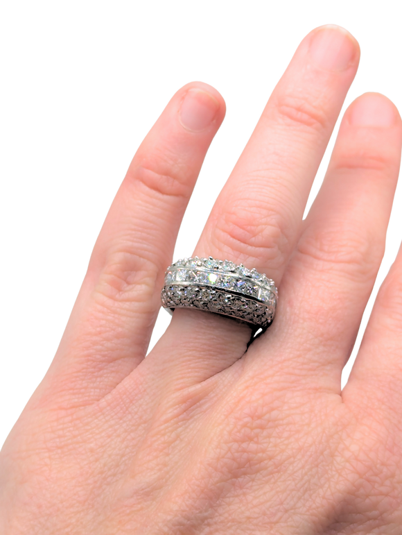 Cushion-shaped platinum ring with round and square diamonds