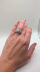 Cushion-shaped platinum ring with round and square diamonds