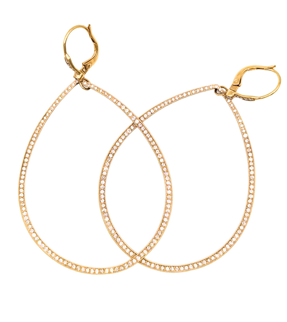 Oval hoop earrings in yellow gold with diamonds