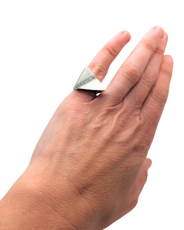 Asymmetrical brushed white gold traingle ring with diamonds