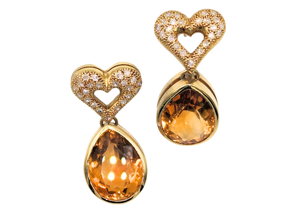 Diamond encrusted yellow gold heart earrings with citrine dangles