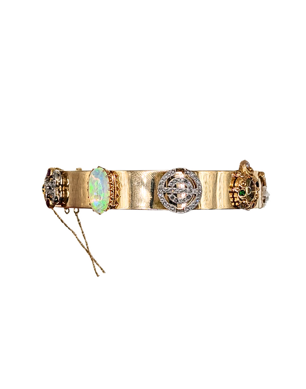 Vintage charm bangle with gemstones and diamonds