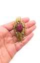 Brutalist ruby brooch in gold with diamonds