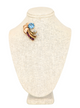 Blue zircon Retro brooch with swirling  rubies and diamonds