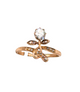 Dainty floral ring with diamond set in swirling gold