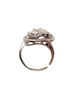 Swirling asymmetrical white gold and diamond ring