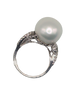 Large silver pearl ring with swirling diamond band