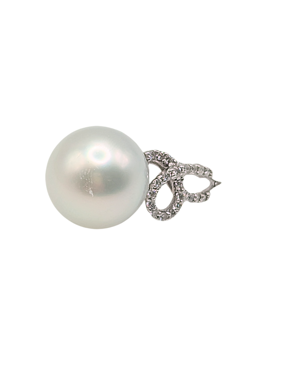 Large silver pearl ring with swirling diamond band