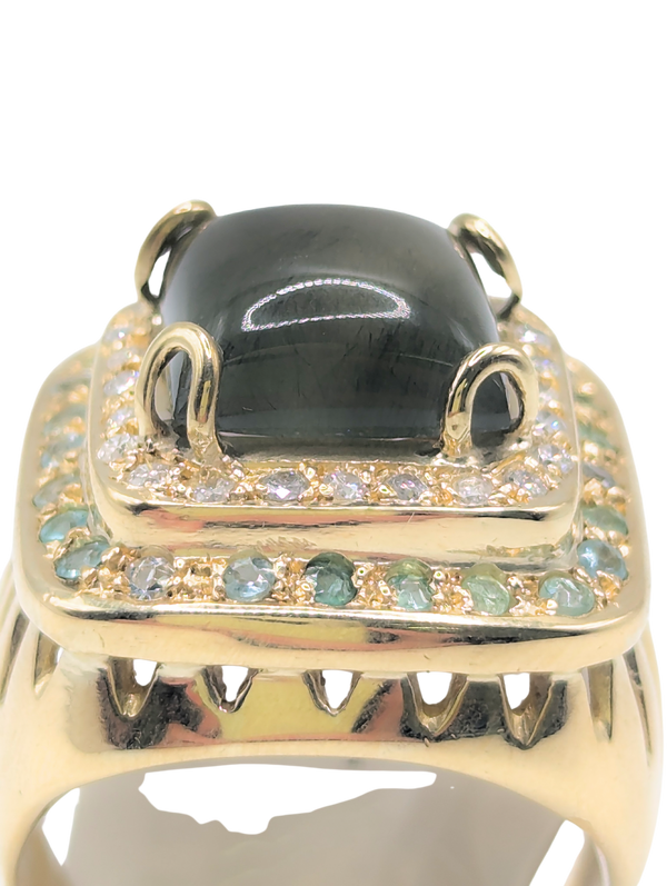 Cabachon quartz with diamond and emerald ring