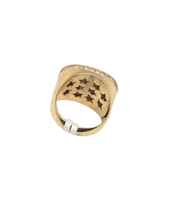 Oversized oval-shaped gold ring with pave diamonds