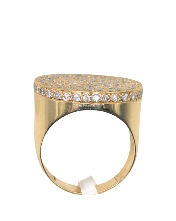 Oversized oval-shaped gold ring with pave diamonds