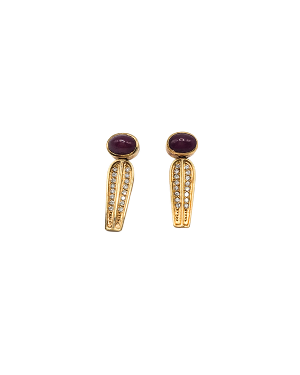 Interesting ruby and diamond earrings in sleek gold design