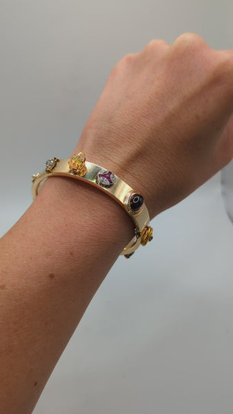 Vintage charm bangle with gemstones and diamonds